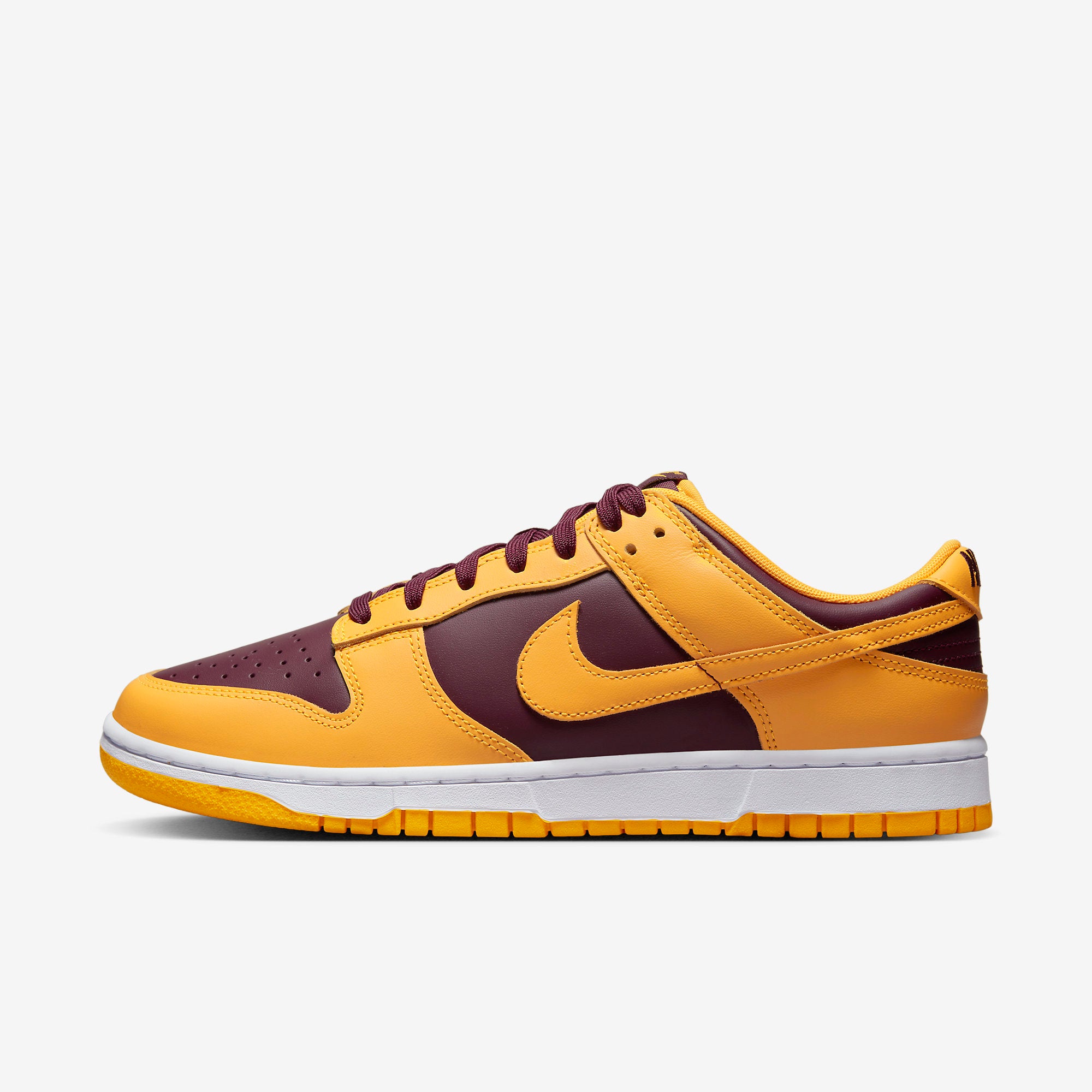 university gold nikes