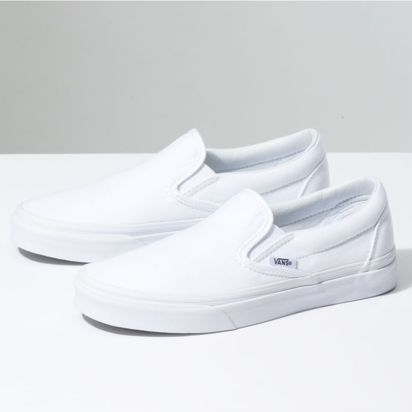 Triple white top vans